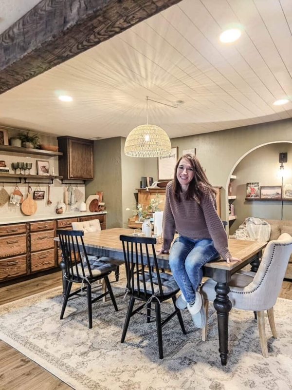 Light Wood Oval Dining Table with Large Arched Mirror