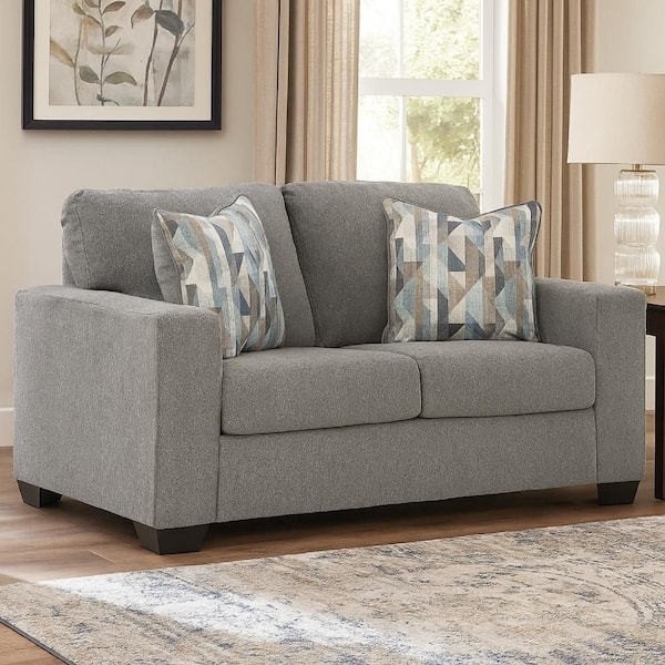 Loveseat Flared Silhouette with Patterned Accent Pillows and Tapered Legs