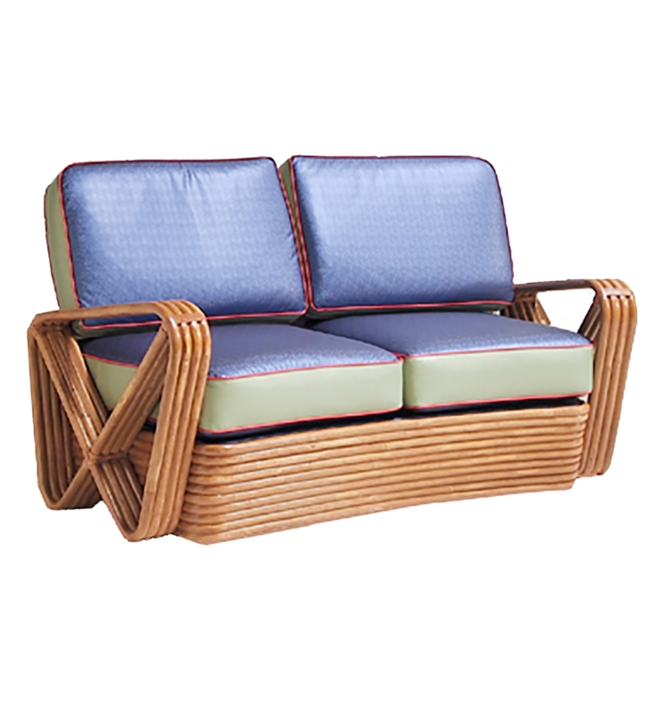 Loveseat with Rattan Woven Frame, Curved Silhouette, and Cream Cushions