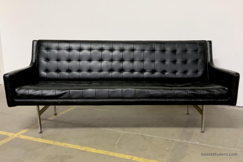 Low-Profile Sofa in Charcoal Gray with Allover Grid Tufting.