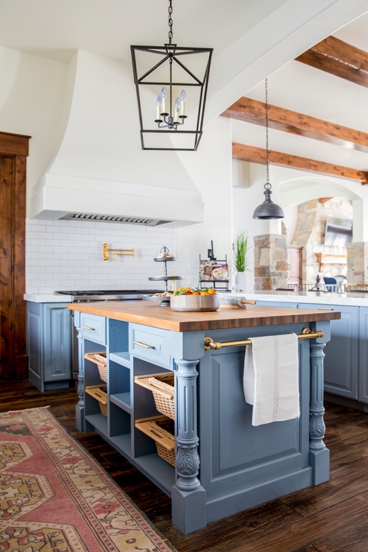 Modern Farmhouse Kitchen Island featuring Thick White Stone-Like Top