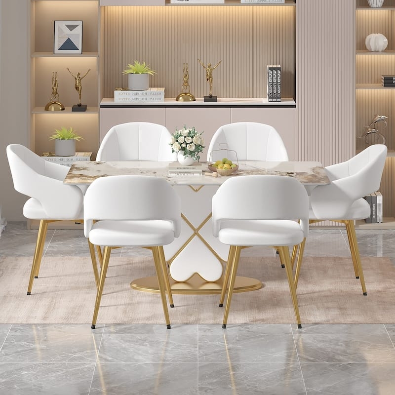Modern Glam Dining Room Layout with Pink Barrel Back Chairs