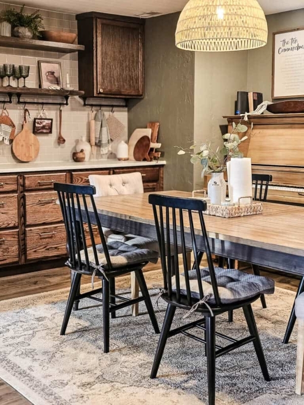 Moody Green Dining Room with Mixed Seating and Spindle Chairs