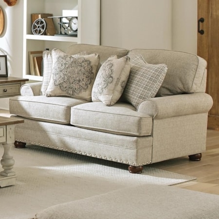 Oatmeal Fabric Loveseat with Rolled Arms and Nailhead Trim