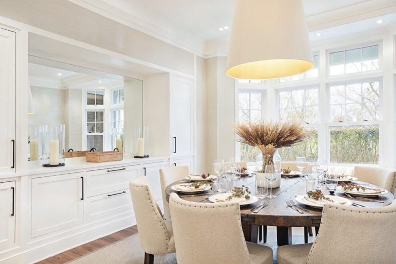 Oval Wood Dining Table Set in a Transitional Dining Room Design