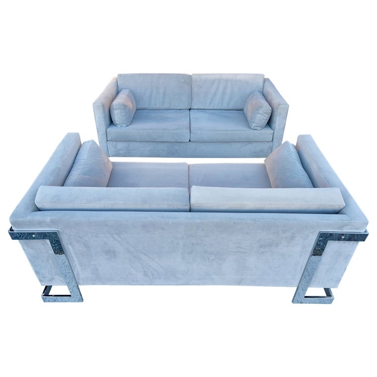 Pair of Grey Velvet Loveseats with Wrap-Around Chrome Frames.