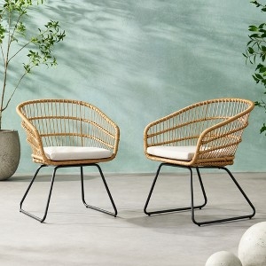 Patio Dining Chairs: Modern Pair with Curved Woven Rattan-Look Seats.