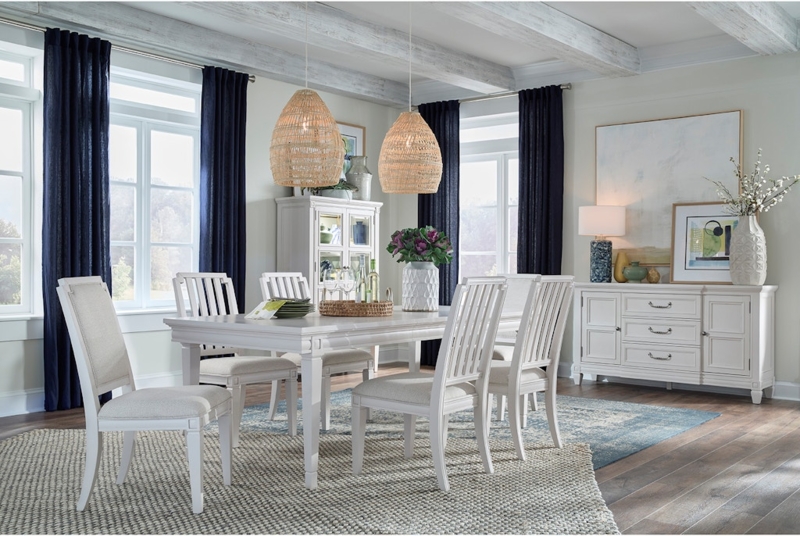 Round Dining Table: Wood-Toned X-Base Pedestal, Matte Finish.