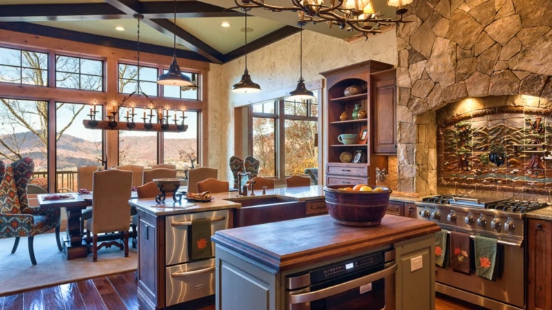 Rustic Lodge Kitchen: Stacked Stone Backsplash and Exposed Beams Design.