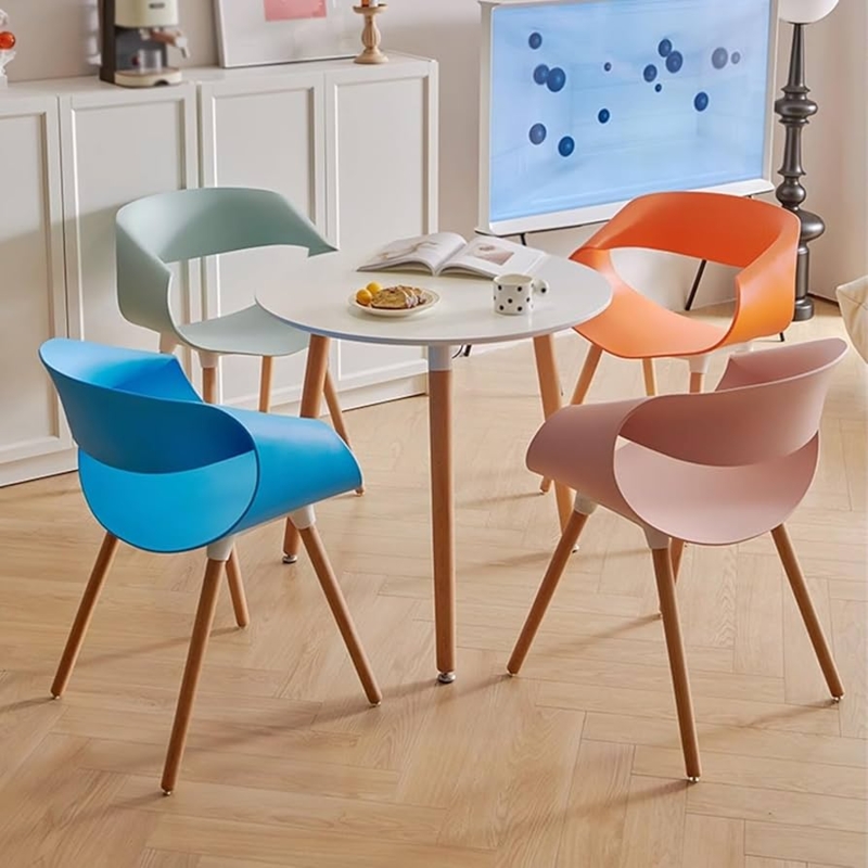 Small Space Dining Set with Round Table and Orange Nesting Chairs
