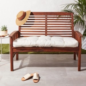Thick Cream Outdoor Loveseat Cushion with Tufted Seat Design