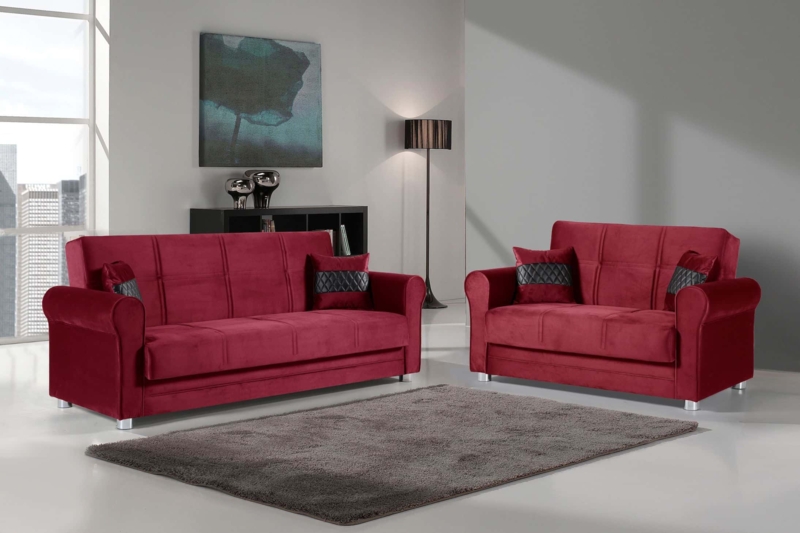 Transitional Burgundy Loveseat with Rolled Arms and Tapered Legs.