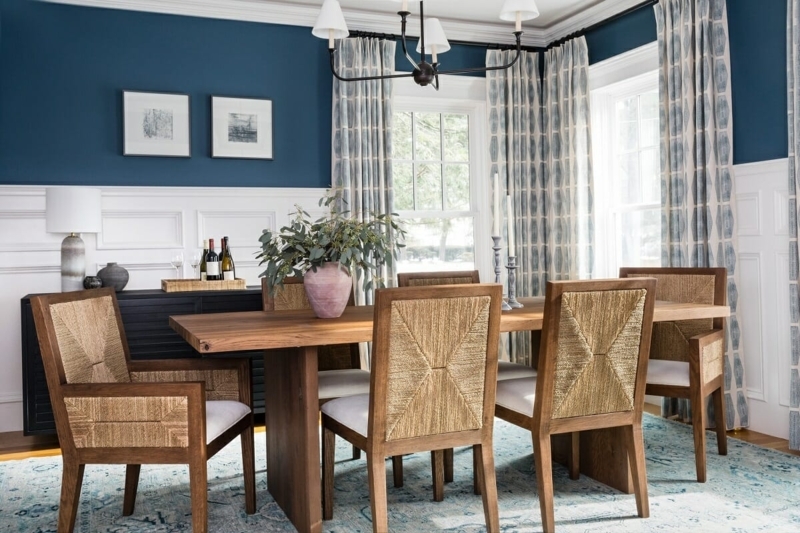 Transitional Dining Table Set with Blue Abstract Art and Cream Chairs