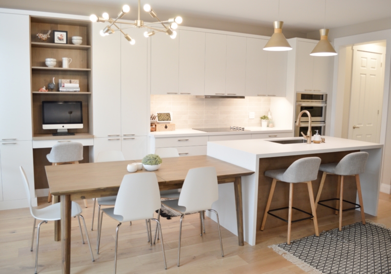 Transitional Kitchen Navy Blue Cabinets Herringbone Flooring Gold Accents