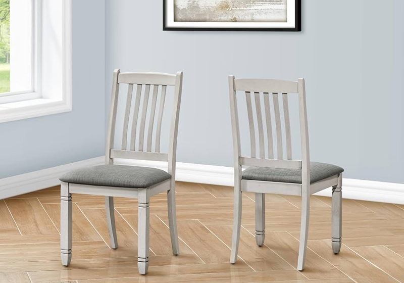 Upholstered Dining Chairs featuring Grey Fabric and Rolled Backs