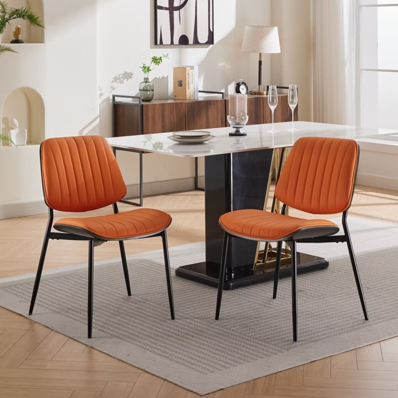 Vibrant Orange Mid-Century Dining Chairs with Vertical Stitch Detail