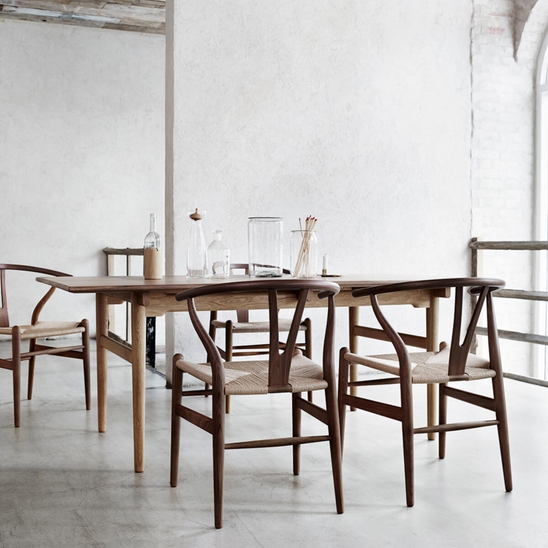 Walnut Toned Wishbone Dining Chair with Natural Woven Paper Cord Seat.