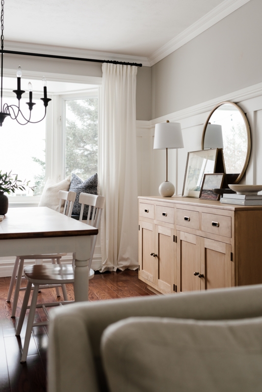 White Transitional Sideboard with Recessed Panels and Black Knobs