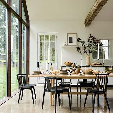 Windsor Dining Chairs in Matte Black Finish with Spindled Backrests.