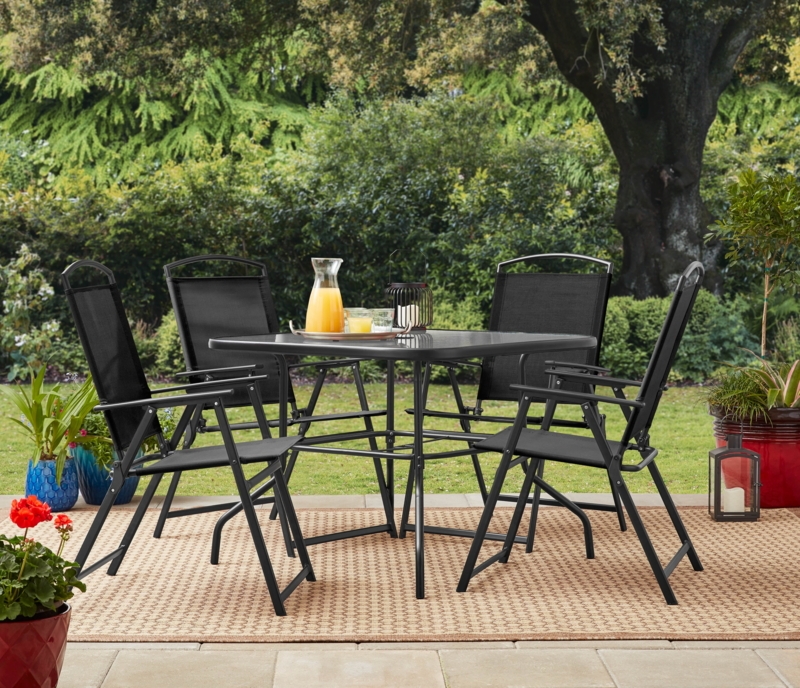 Black Metal Outdoor Dining Set: Tile Top Square Table, Gray Cushions.
