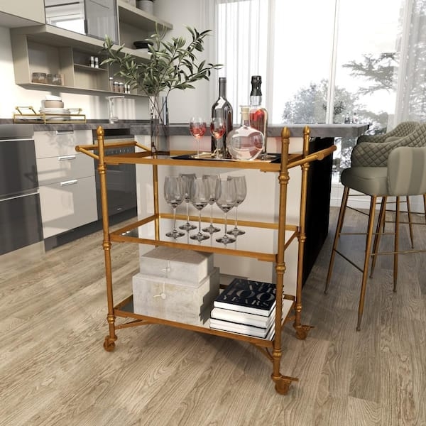 Glam Gold Bar Cart with Oval Silhouette and Two Dark Tiers