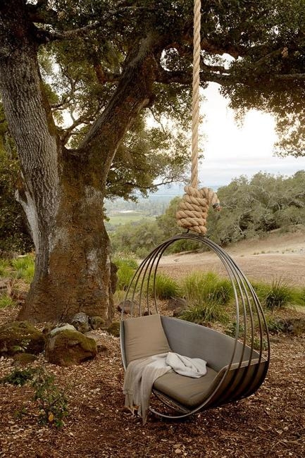 Hanging Chair with Globe Silhouette & Scarlet Cushion. Patio Seating.