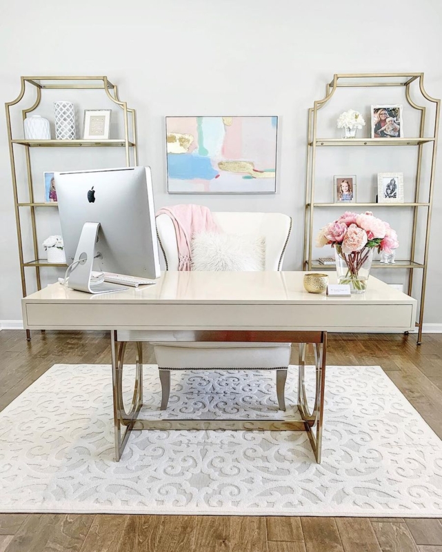 Home Office Symmetrical Layout Gold Etagere Bookshelves Pink Accents