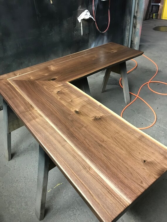 L-Shaped Desk Wood Toned Top, Black Steel Base, Industrial Modern.