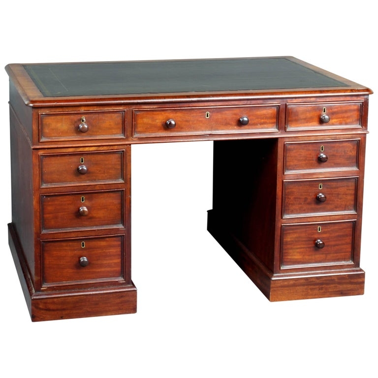 Mahogany Pedestal Desk featuring Nine Drawer Symmetry and Gold Tooling