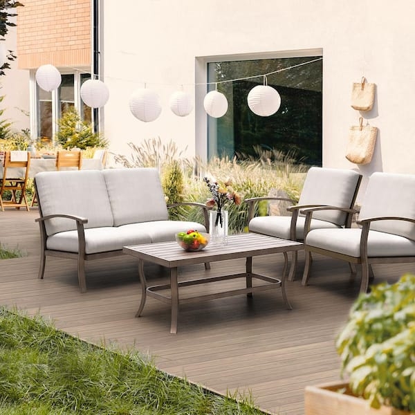 Minimalist Outdoor Conversation Area with Mixed Material Slatted Design