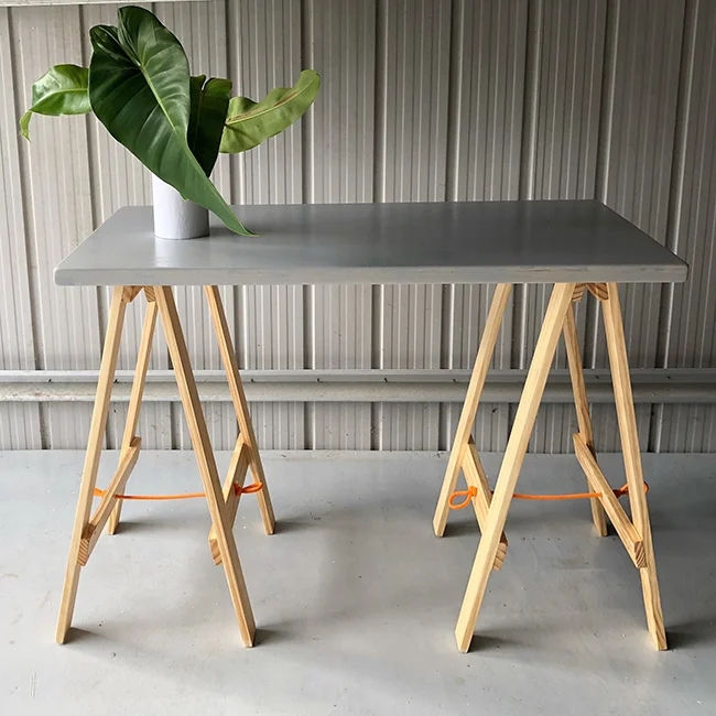 Minimalist Trestle Dining Table with A-Frame Legs and Plank Top