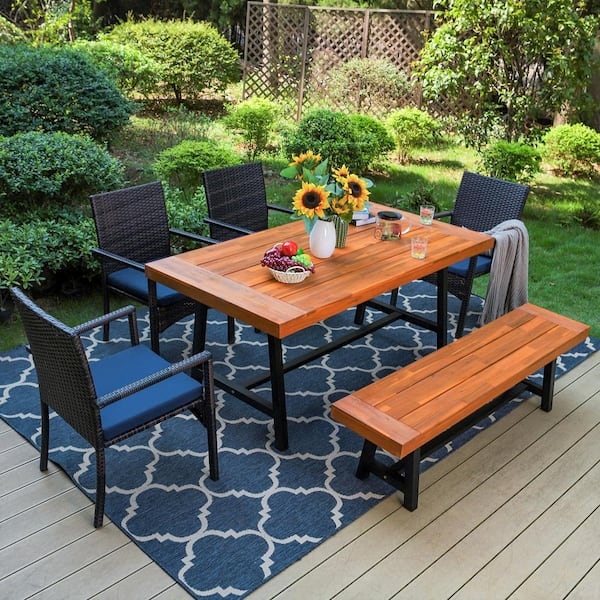 Mixed Materials Outdoor Dining Set with Woven Rattan Chairs