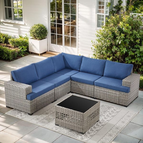 Modern Navy Blue Outdoor Seating with Taupe Wicker and Glass Top Table