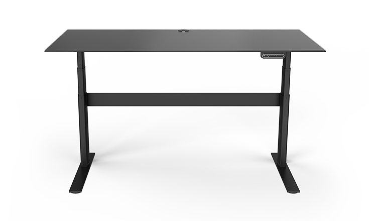 Modern Standing Desk with Glass Top and Power Adjustable Base in a Loft