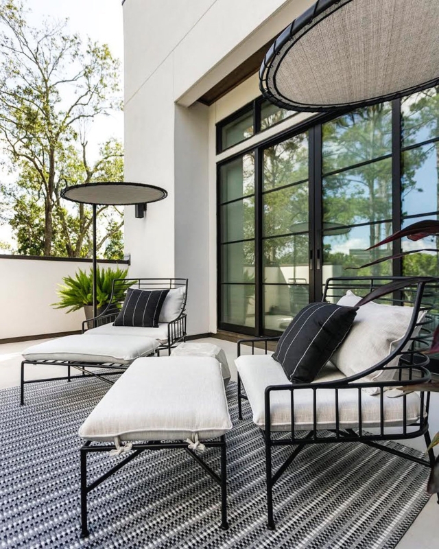 Outdoor Chair: Minimalist Matte Black Metal Curved Tubular Back