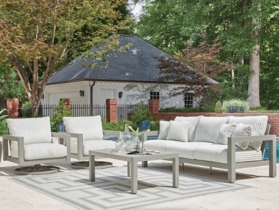 Outdoor Conversation Set Wood Slatted Table Top with Teal Pillows.