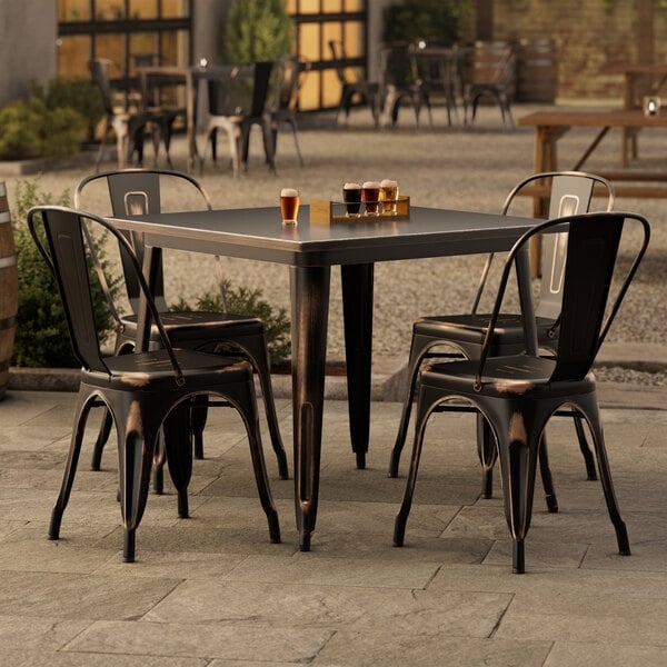 Outdoor Dining Set, 5-Piece Industrial with Distressed Copper Finish.