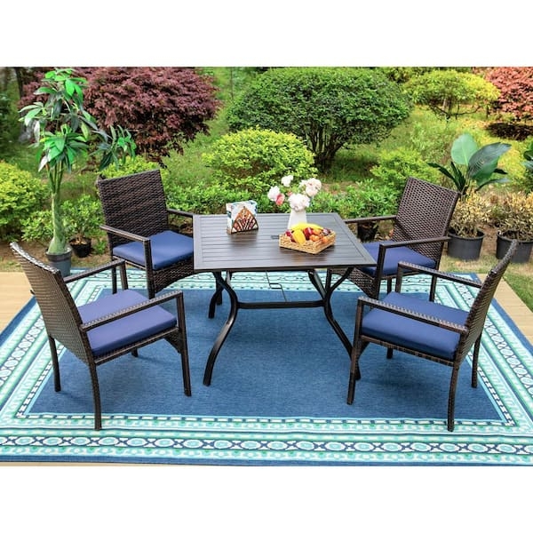 Outdoor Dining Set Black Metal Slat Table Woven Chairs Blue Cushions