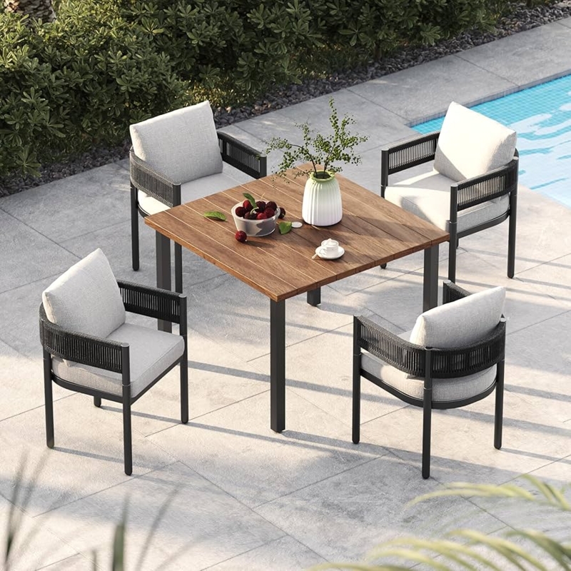 Outdoor Dining Set: Black Wicker, Square Wood-Toned Table, Modern Deck.