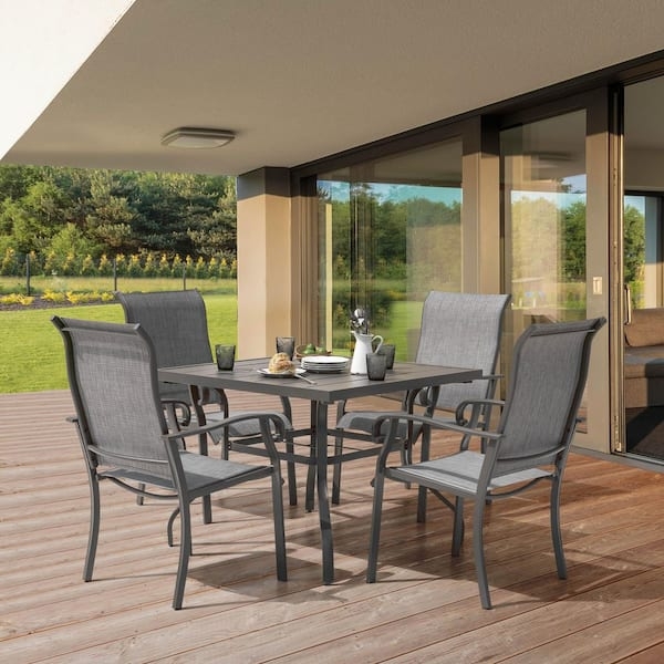 Outdoor Dining Set: Gray Mesh Chairs, Square Wood-Toned Slatted Table.