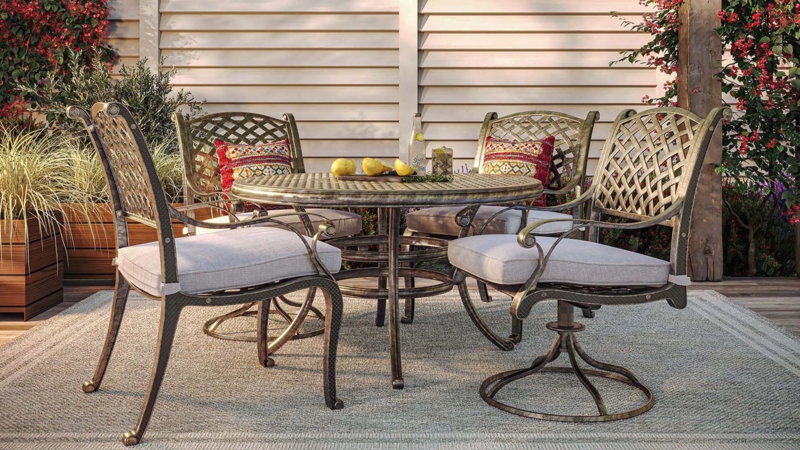 Outdoor Dining Set Grey Woven Barrel Chairs Round Wood Grain Top