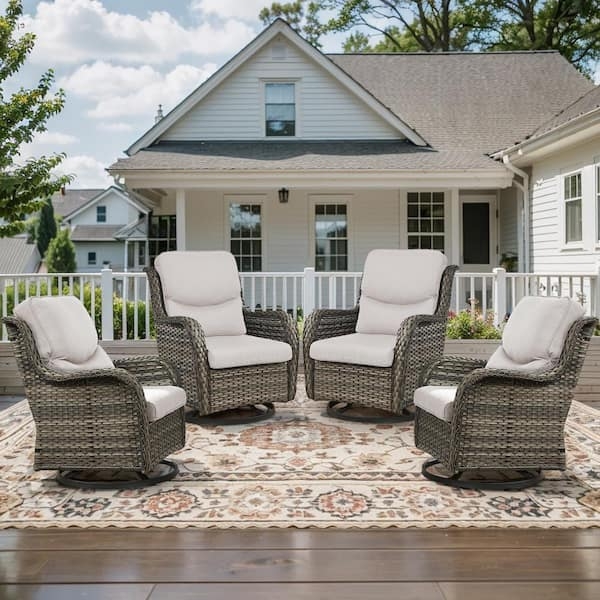 Outdoor Rocking Chair: Gray Wicker Swivel Base with Thick Beige Cushions
