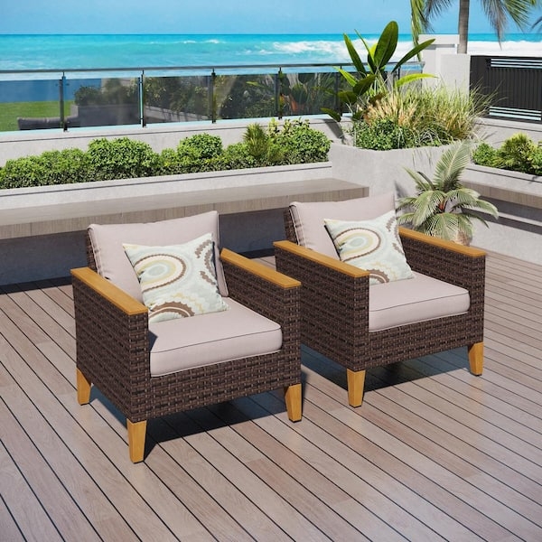 Pair of Outdoor Lounge Chairs Woven Rattan Sloped Back Design