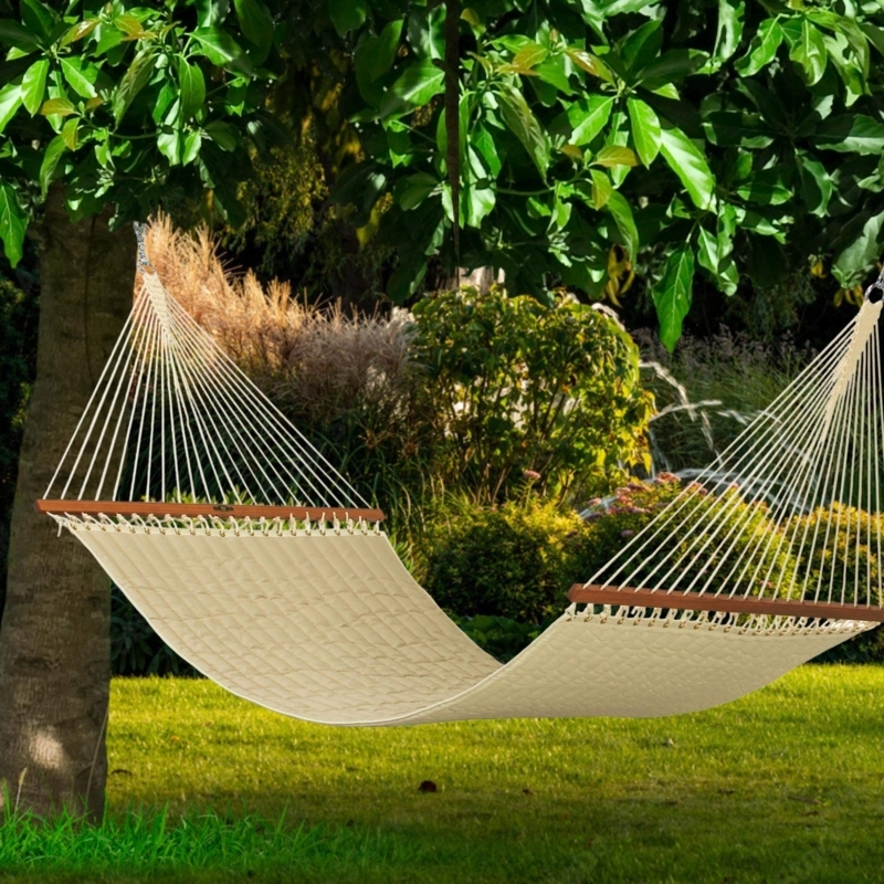 Quilted Fabric Hammock with Wood Spreader Bars in Neutral Sand