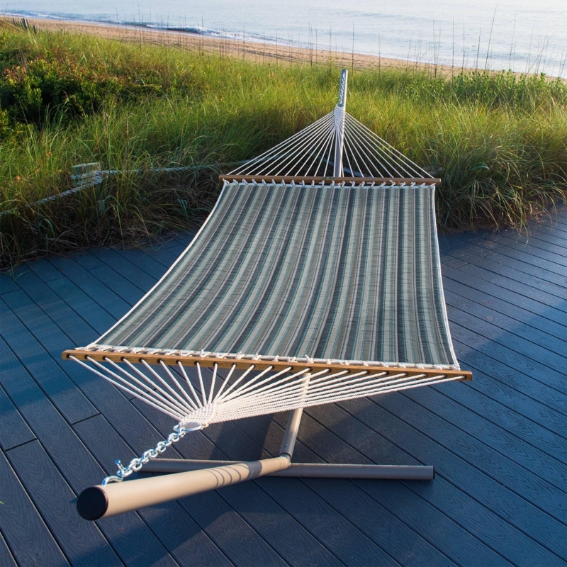 Quilted Hammock with Spreader Bars on Metal Stand for Backyard Relaxation