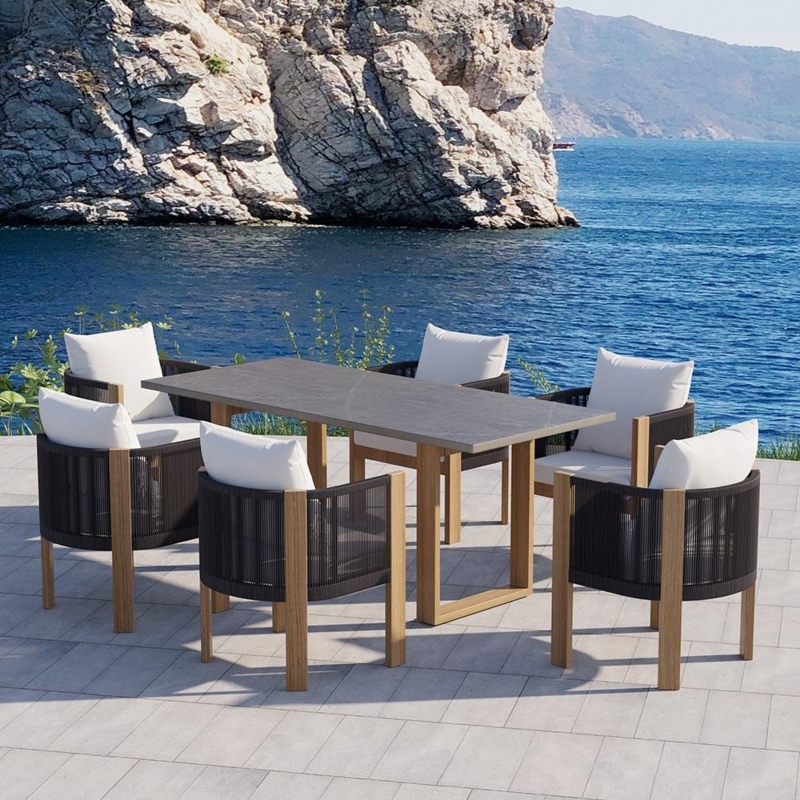 Sophisticated 7-Piece Outdoor Dining Set Gray Marbled Top Woven Rope