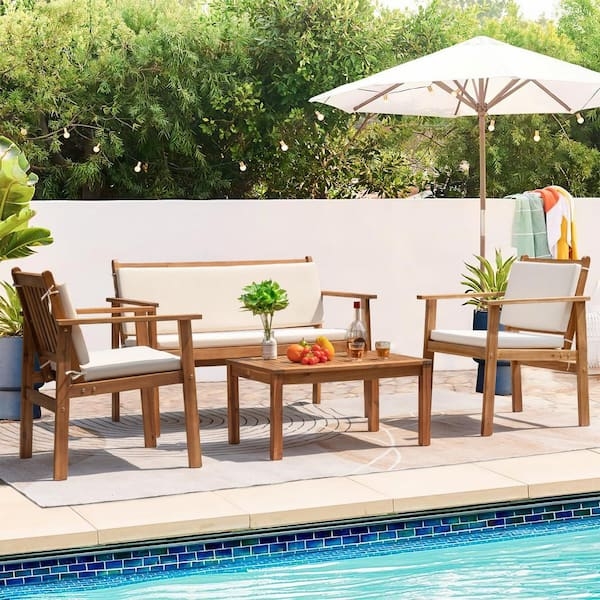 Warm Wood Patio Conversation Set Low Profile Cream Cushions Navy Pillows