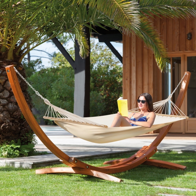 White Quilted Hammock Arched Wood Stand Backyard Lounge Design