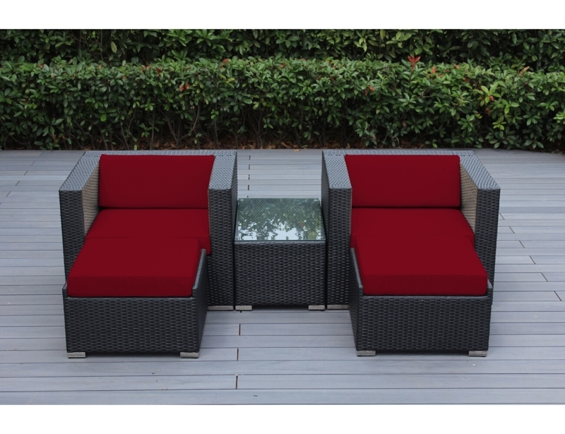 Wicker Conversation Set featuring Vibrant Orange Cushions for Poolside