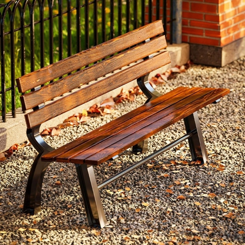Wood Garden Bench. Curved backrest, slatted design, warm brown finish.